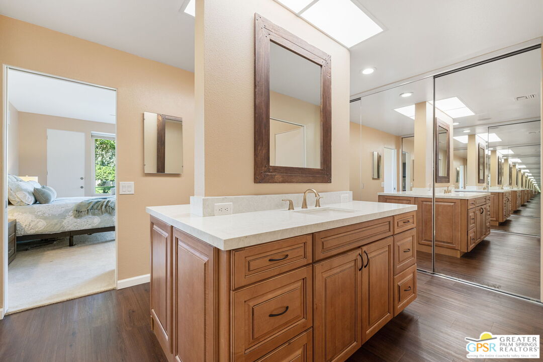 651 Hospitality Drive Rancho Mirage, CA 92270 - Photo 35 of 44 a bathroom with a sink double vanity and a mirror