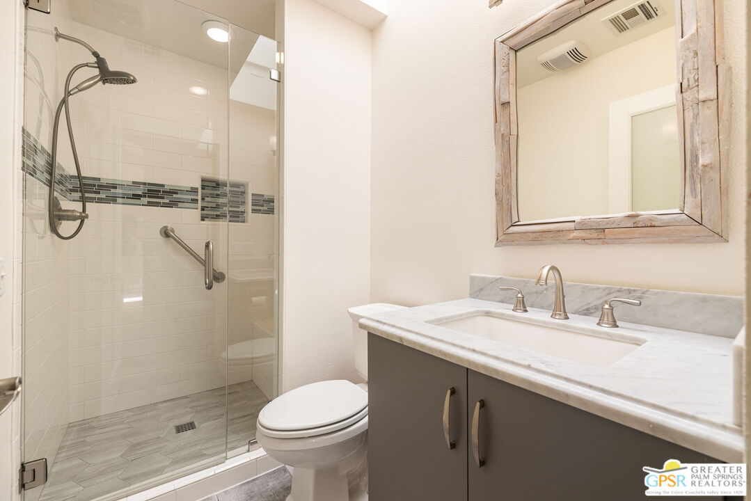 651 Hospitality Drive Rancho Mirage, CA 92270 - Photo 44 of 44 a bathroom with a sink a toilet and shower