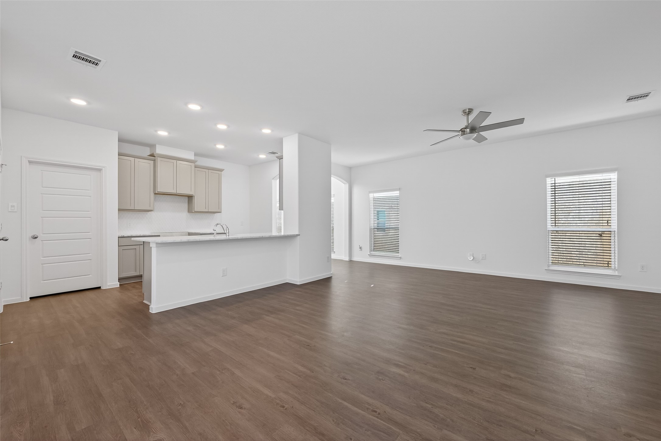 12375 Sunset Canyon Way Willis, TX 77318 - Photo 12 of 40 a view of kitchen with wooden floor and window