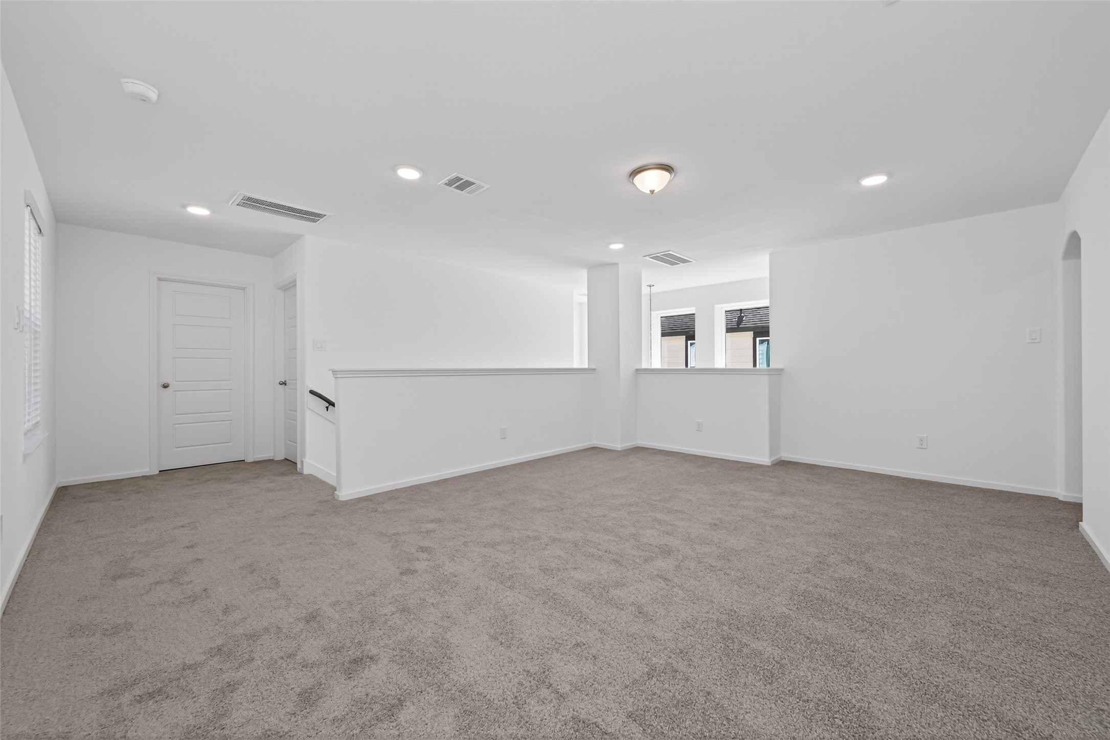 12375 Sunset Canyon Way Willis, TX 77318 - Photo 30 of 40 an empty room with white walls and windows