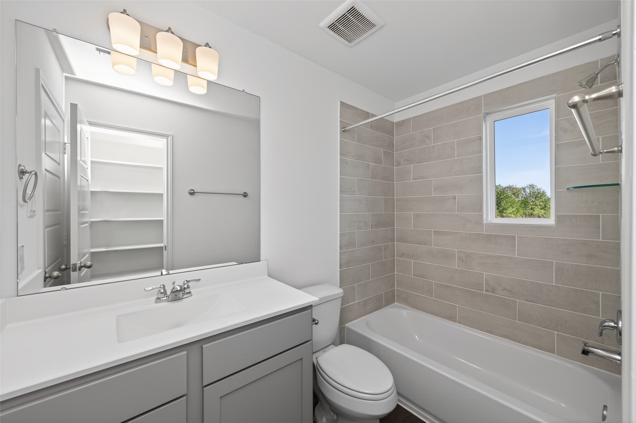 12375 Sunset Canyon Way Willis, TX 77318 - Photo 34 of 40 a bathroom with a sink a toilet and shower