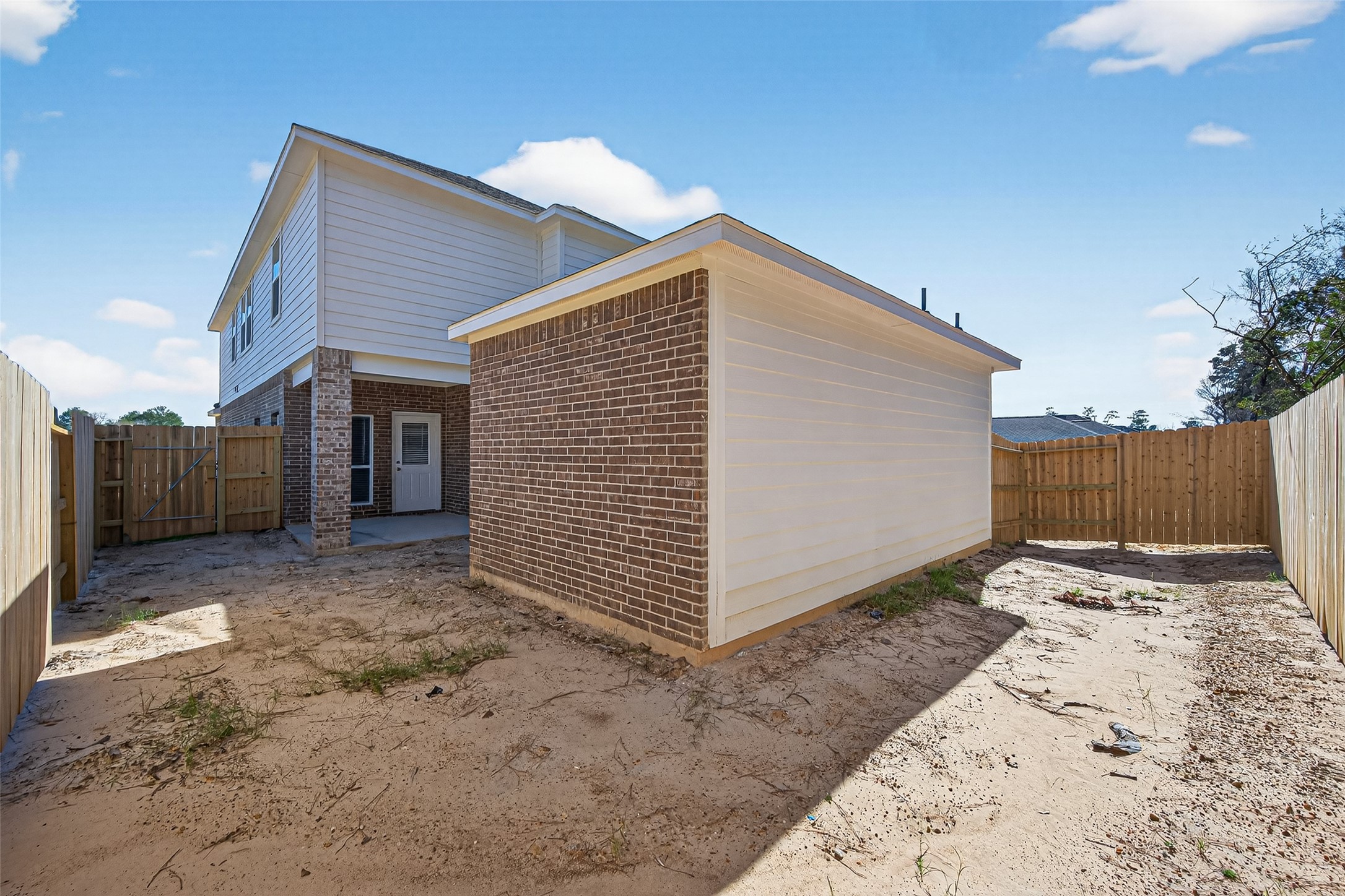 12375 Sunset Canyon Way Willis, TX 77318 - Photo 38 of 40 a view of a backyard