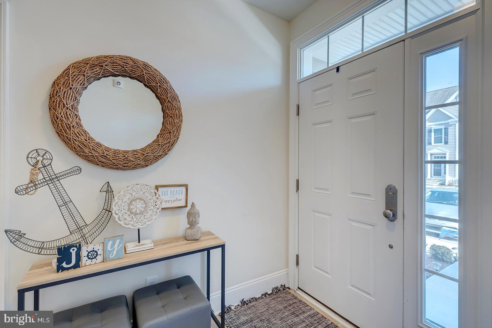 18799 Bethpage Drive, Unit 16E Lewes, DE 19958 - Photo 3 of 68 a bathroom with a sink and a mirror