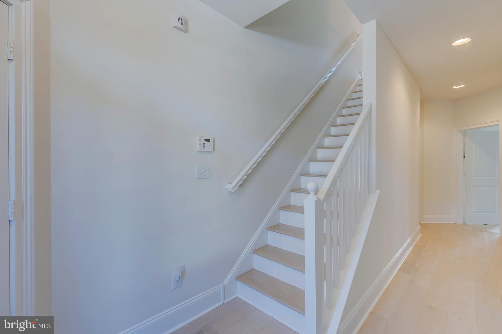 18799 Bethpage Drive, Unit 16E Lewes, DE 19958 - Photo 38 of 68 a view of entryway with wooden floor