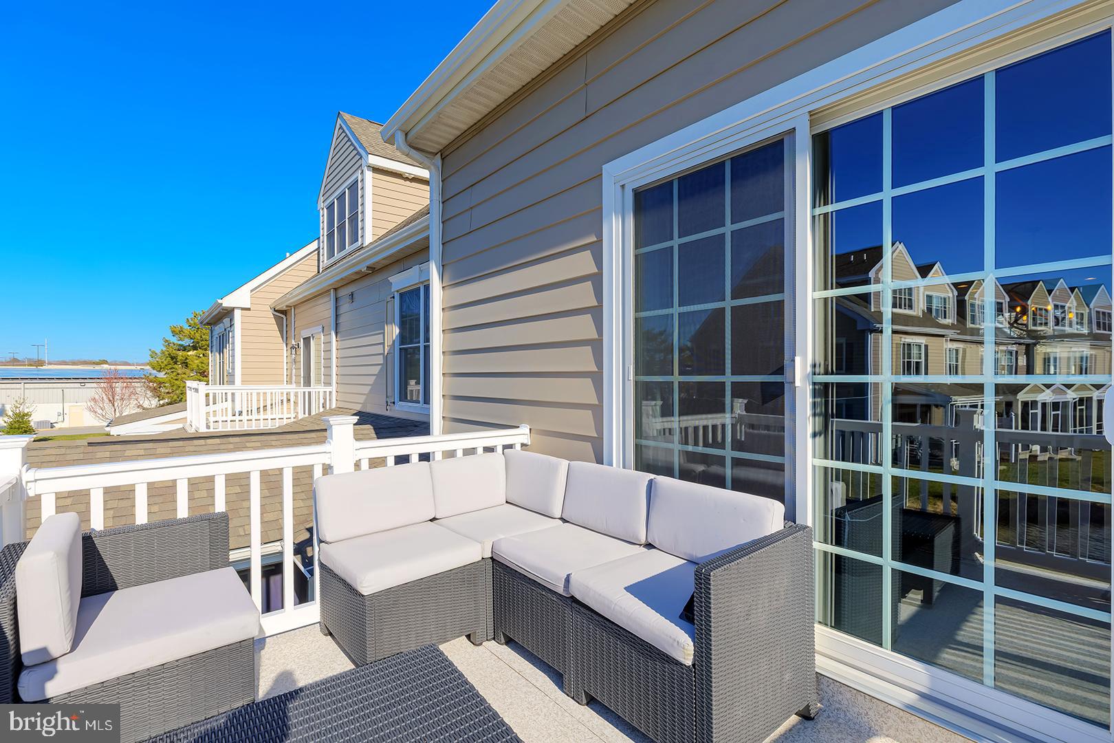 18799 Bethpage Drive, Unit 16E Lewes, DE 19958 - Photo 41 of 68 a view of a balcony with chairs