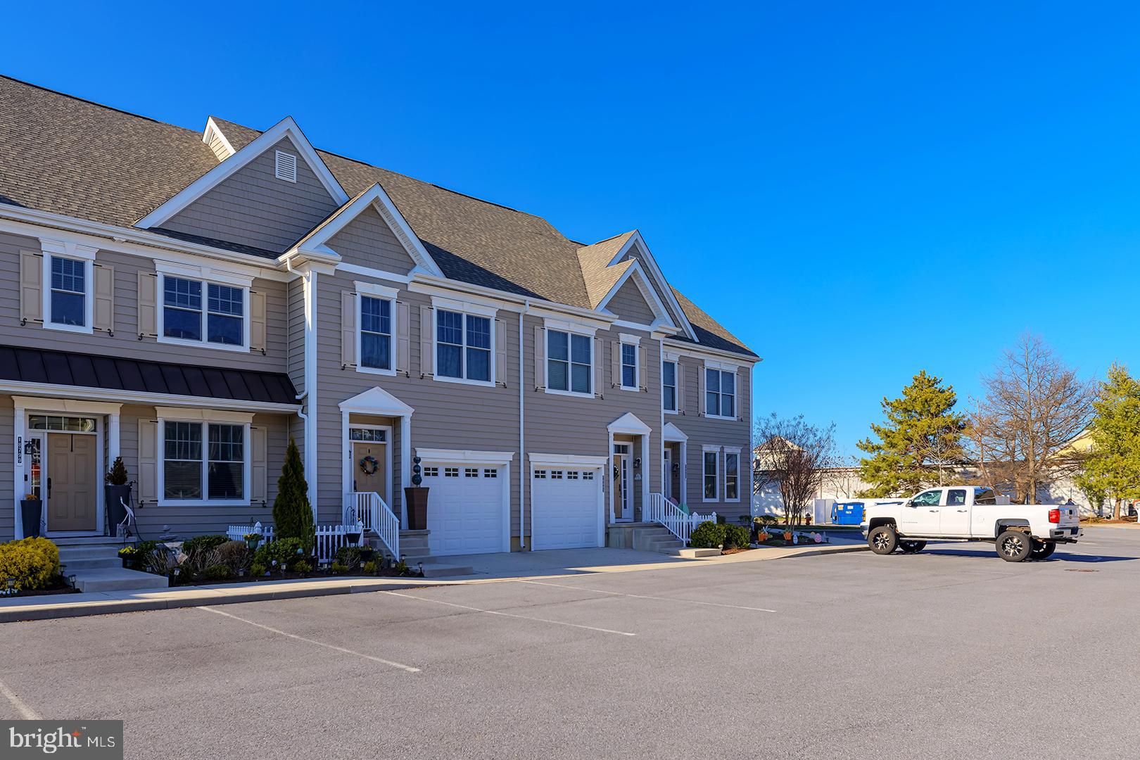 18799 Bethpage Drive, Unit 16E Lewes, DE 19958 - Photo 55 of 68 a view of multiple houses with a street