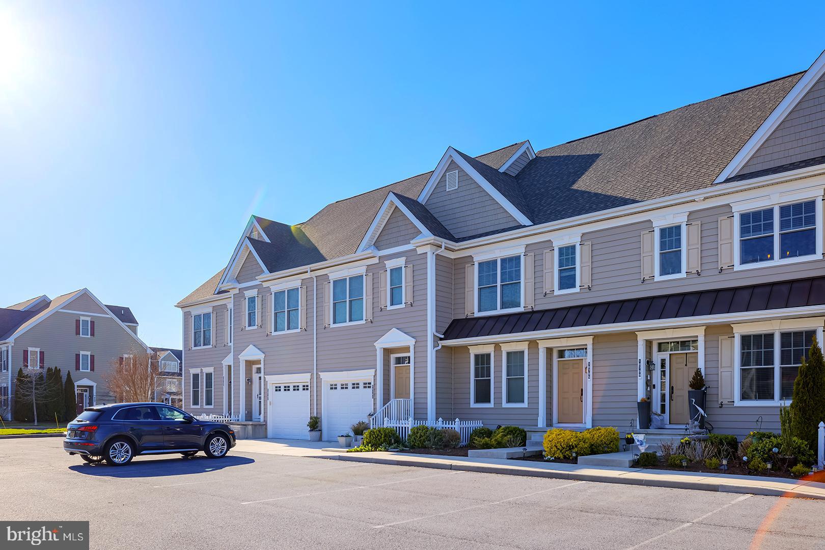18799 Bethpage Drive, Unit 16E Lewes, DE 19958 - Photo 56 of 68 a front view of a building with street view