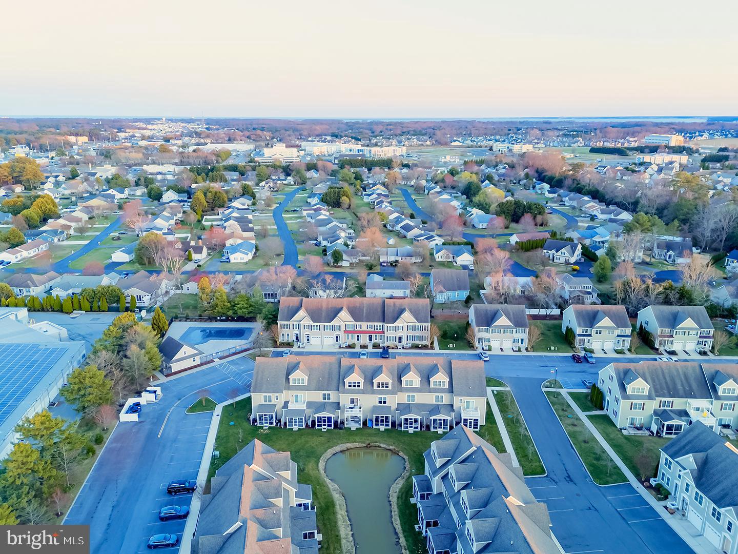 18799 Bethpage Drive, Unit 16E Lewes, DE 19958 - Photo 59 of 68 an aerial view of swimming pool patio and mountain view