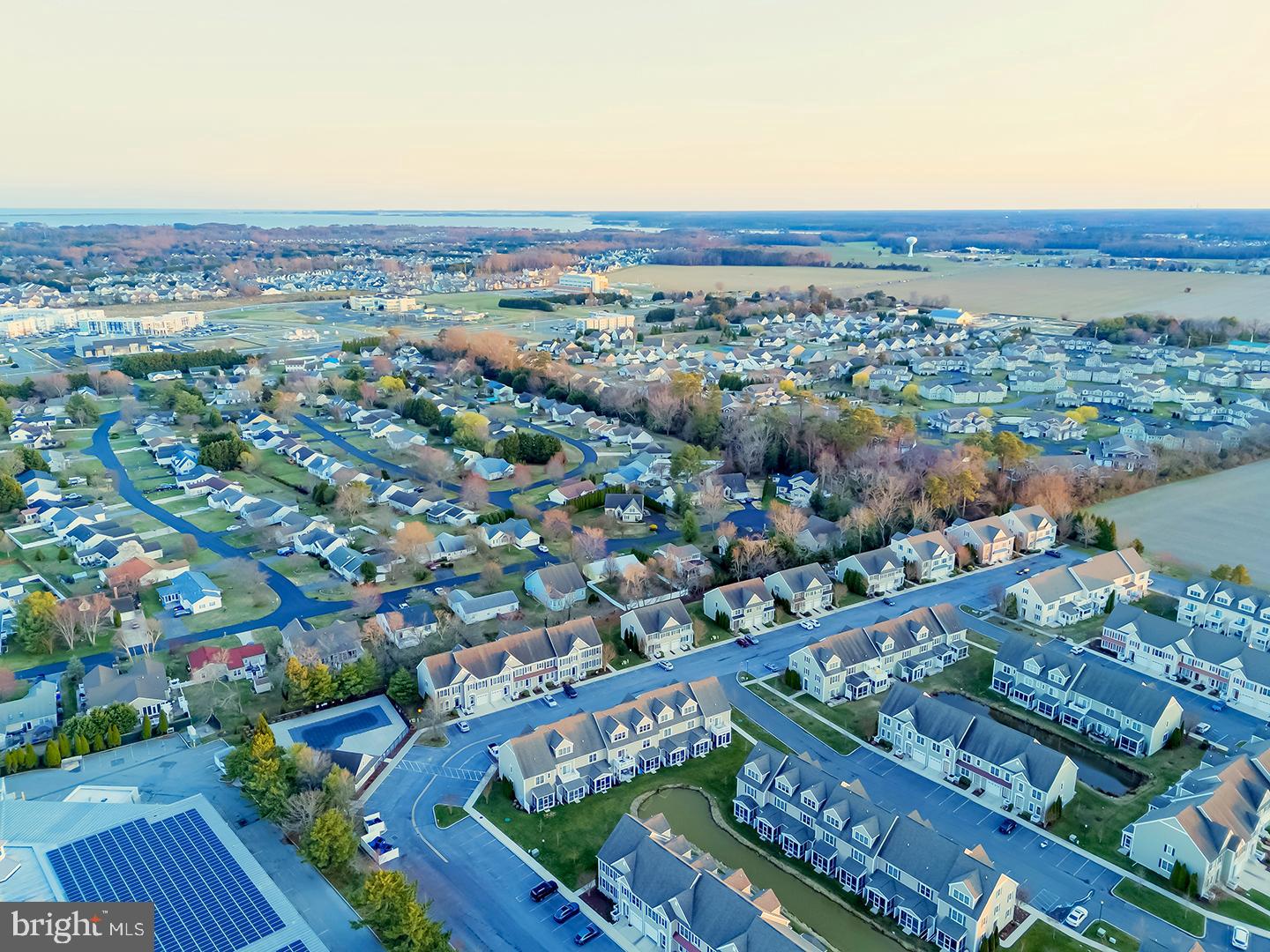 18799 Bethpage Drive, Unit 16E Lewes, DE 19958 - Photo 63 of 68 a view of a city with tall buildings