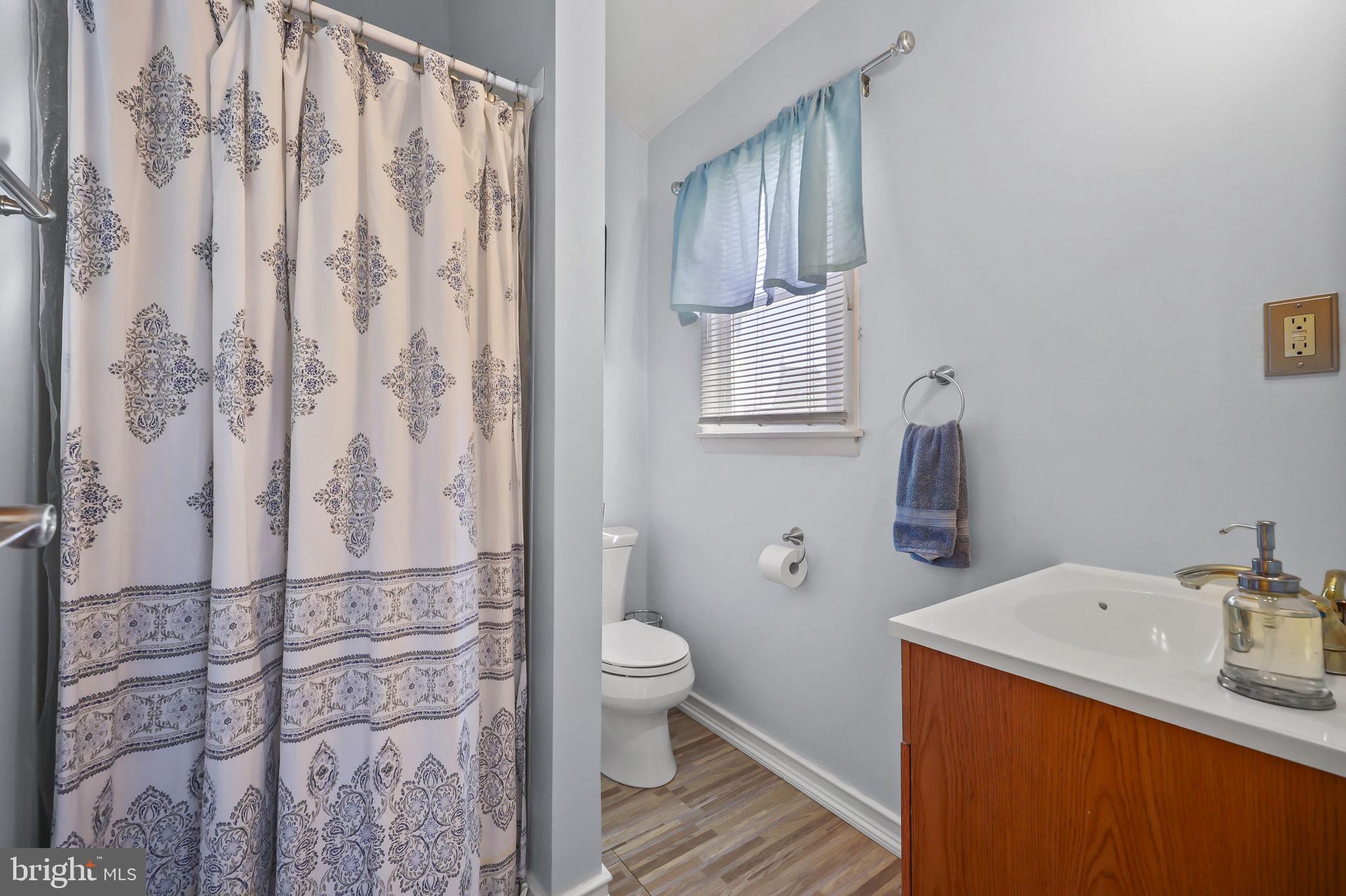 17 Maguire Road Hamilton, NJ 08690 - Photo 15 of 37 a bathroom with a sink toilet and shower
