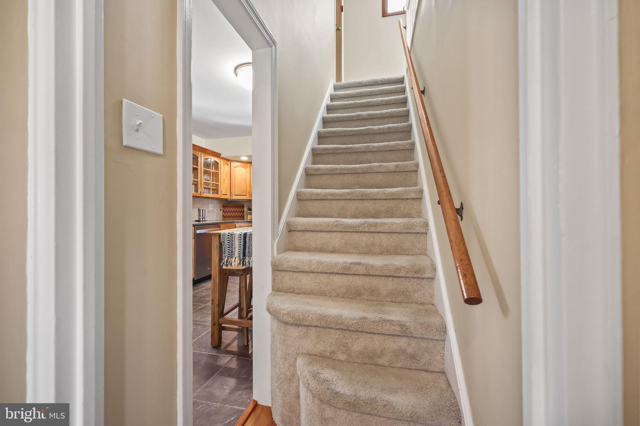 17 Maguire Road Hamilton, NJ 08690 - Photo 20 of 37 a view of staircase with white walls and white door