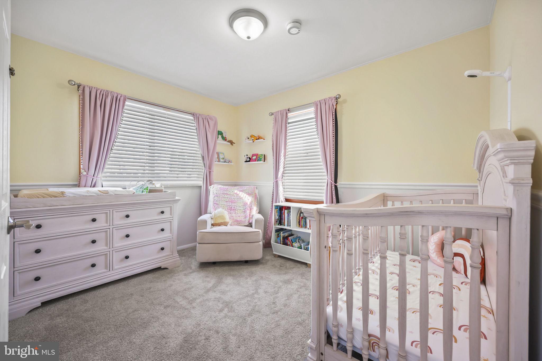 17 Maguire Road Hamilton, NJ 08690 - Photo 23 of 37 a bed room with a bed and a window
