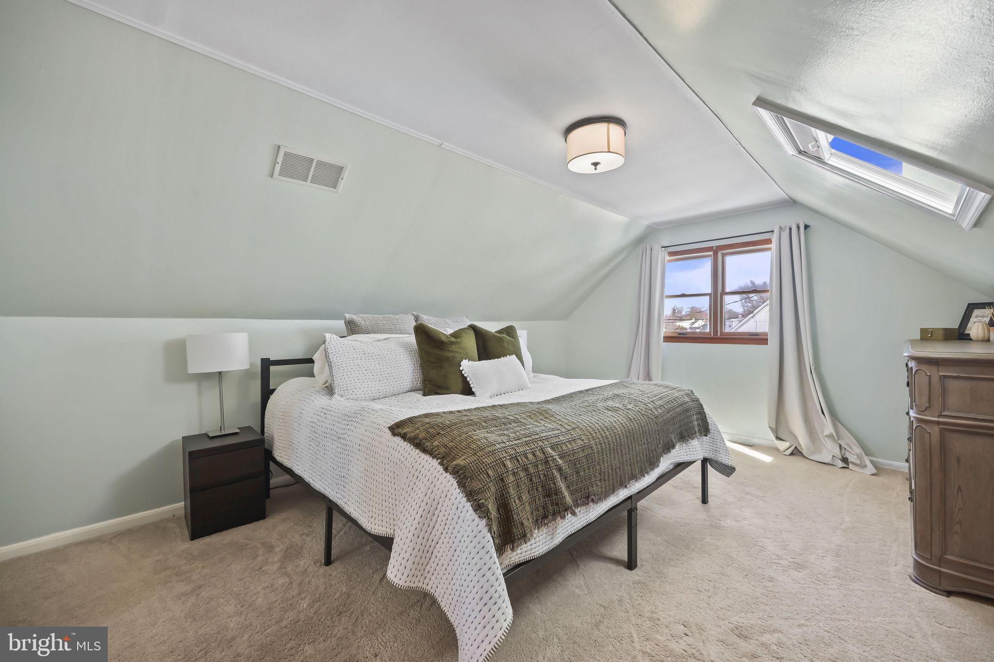 17 Maguire Road Hamilton, NJ 08690 - Photo 26 of 37 a bedroom with a bed and a flat screen tv