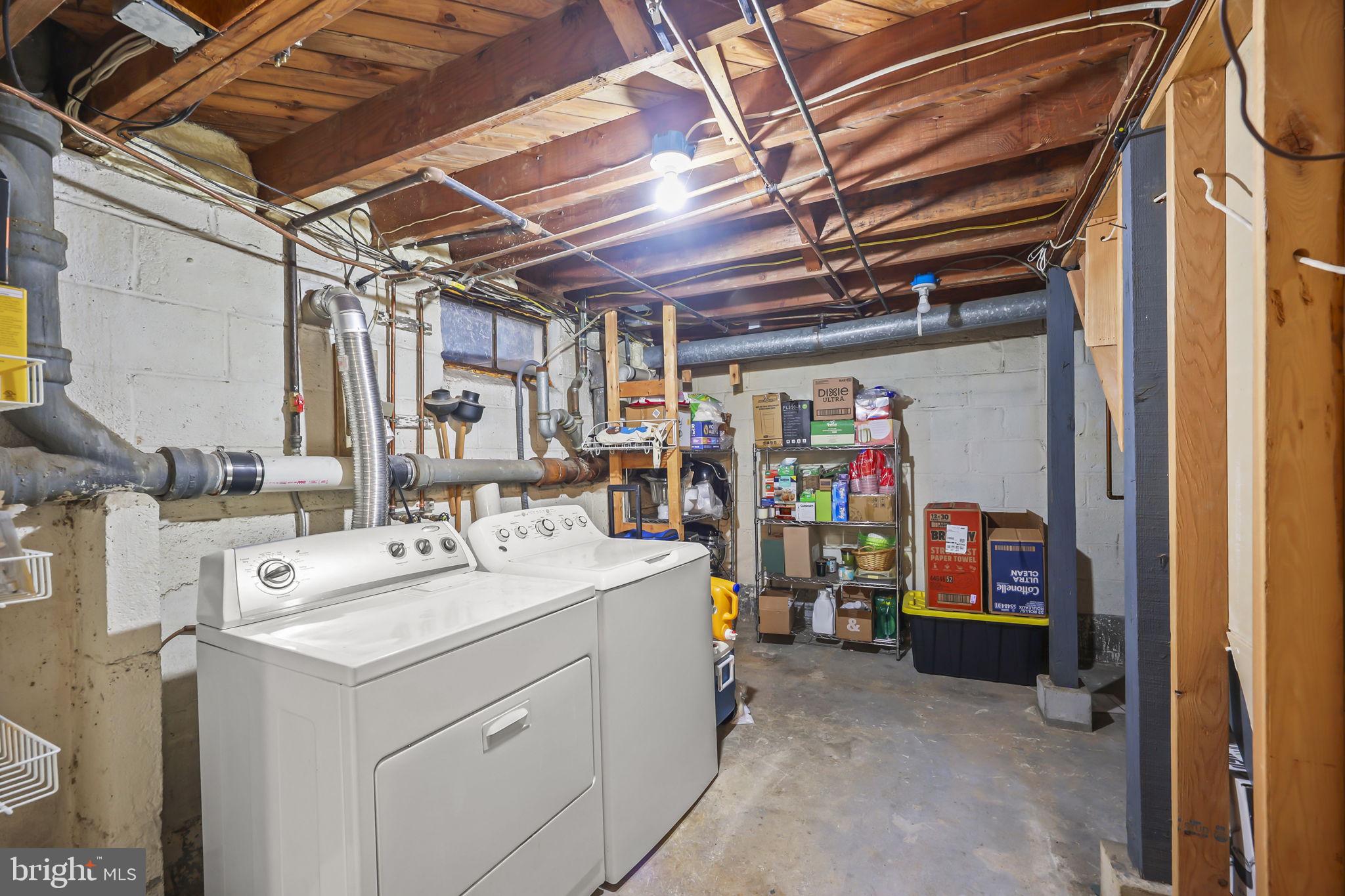 17 Maguire Road Hamilton, NJ 08690 - Photo 33 of 37 a utility room with dryer and washer