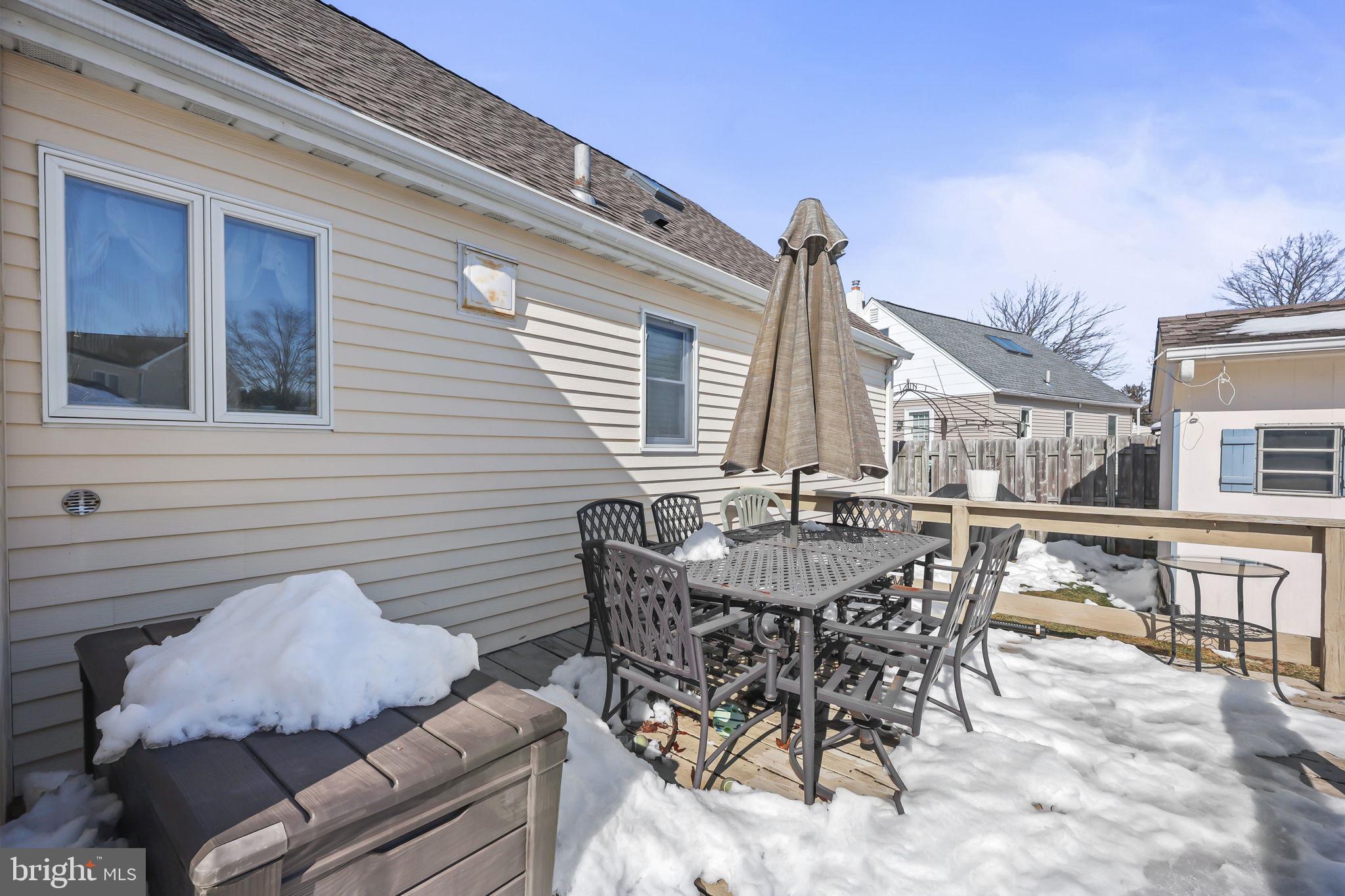 17 Maguire Road Hamilton, NJ 08690 - Photo 35 of 37 a view of a dinning table and chairs in the balcony