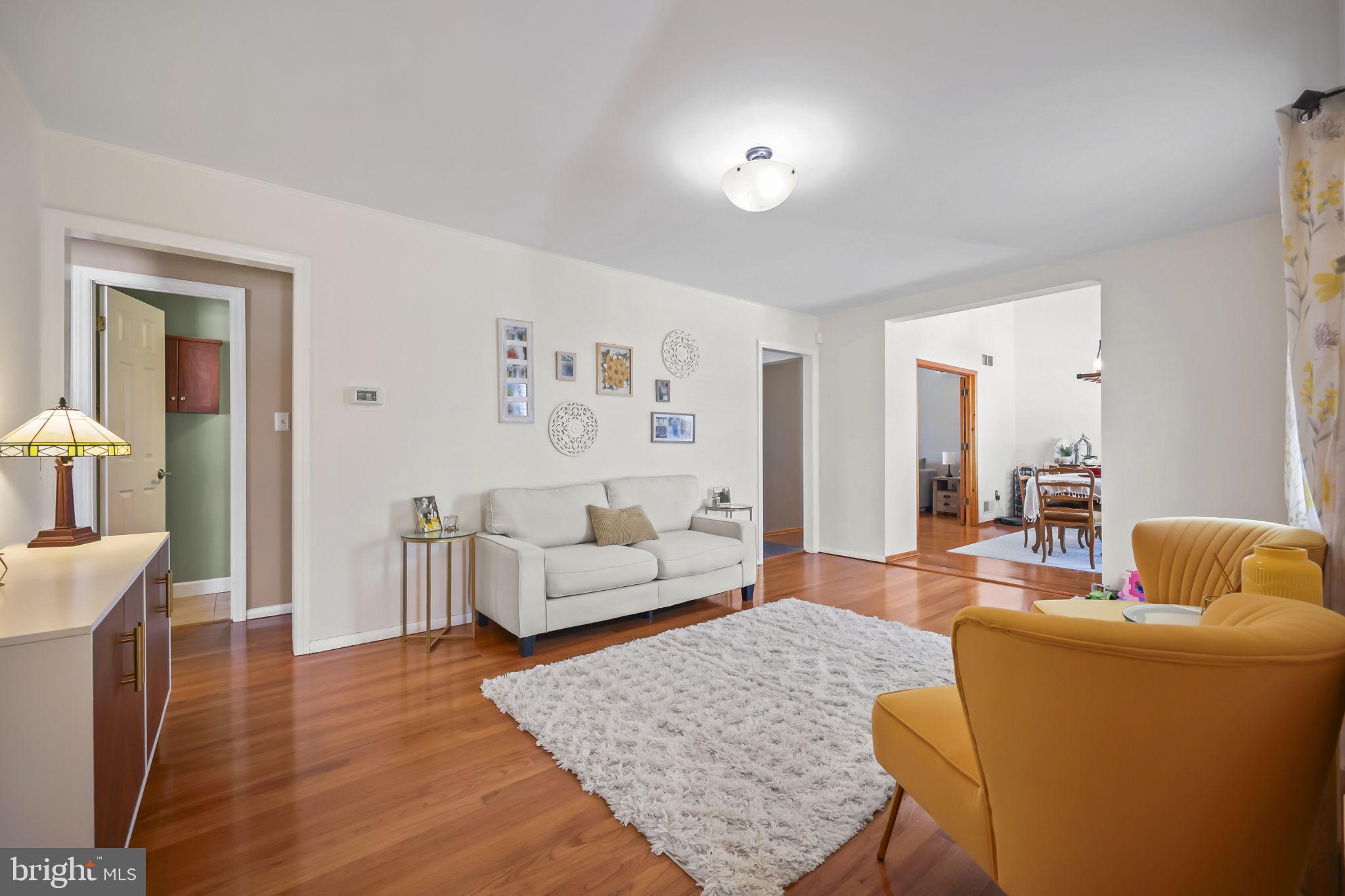 17 Maguire Road Hamilton, NJ 08690 - Photo 5 of 37 a living room with furniture and wooden floor
