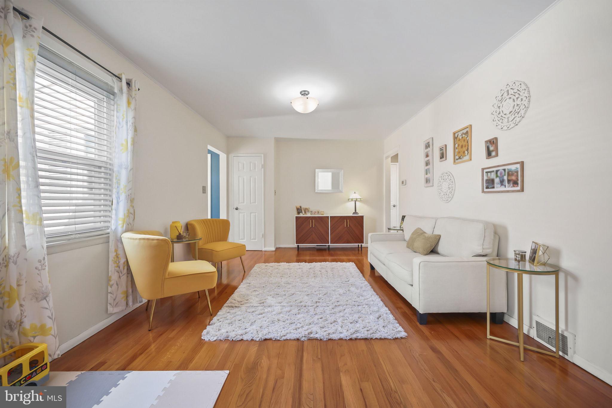 17 Maguire Road Hamilton, NJ 08690 - Photo 6 of 37 a living room with furniture and a wooden floor