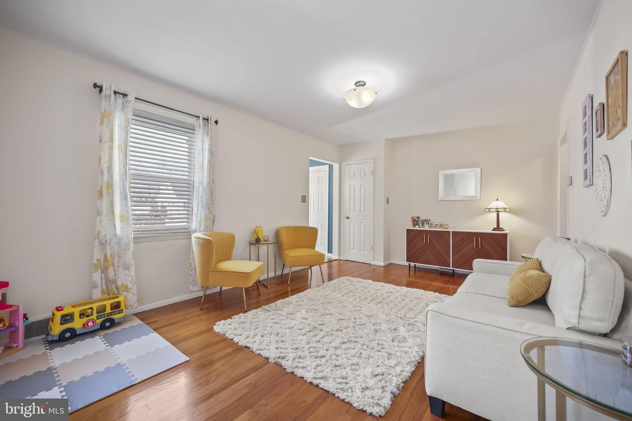 17 Maguire Road Hamilton, NJ 08690 - Photo 7 of 37 a living room with furniture and wooden floor