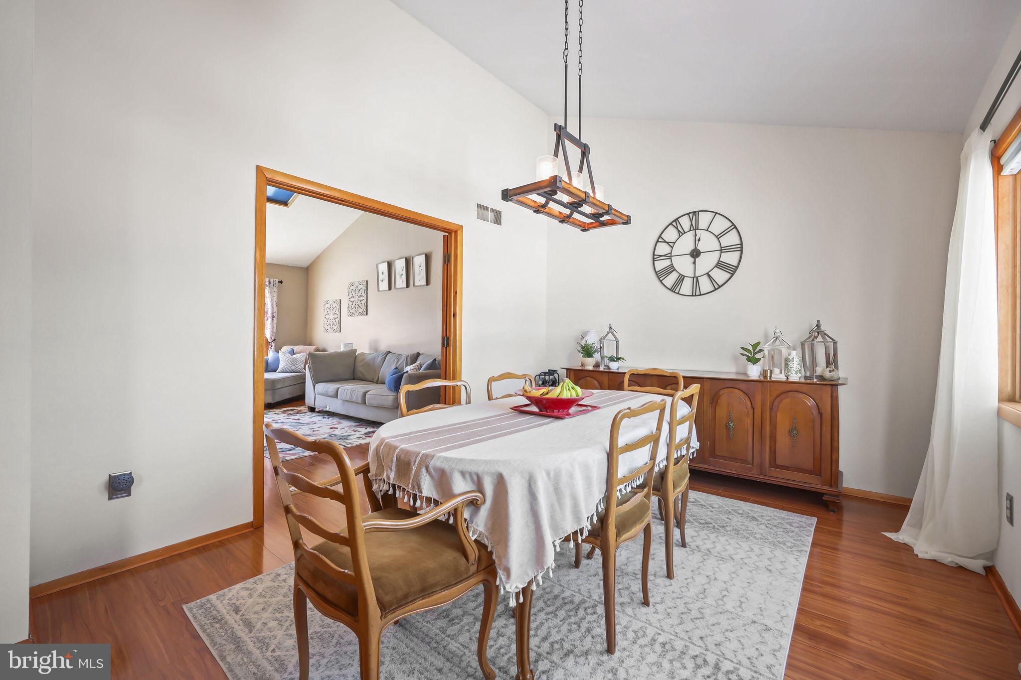 17 Maguire Road Hamilton, NJ 08690 - Photo 9 of 37 a dining room with a table and chairs