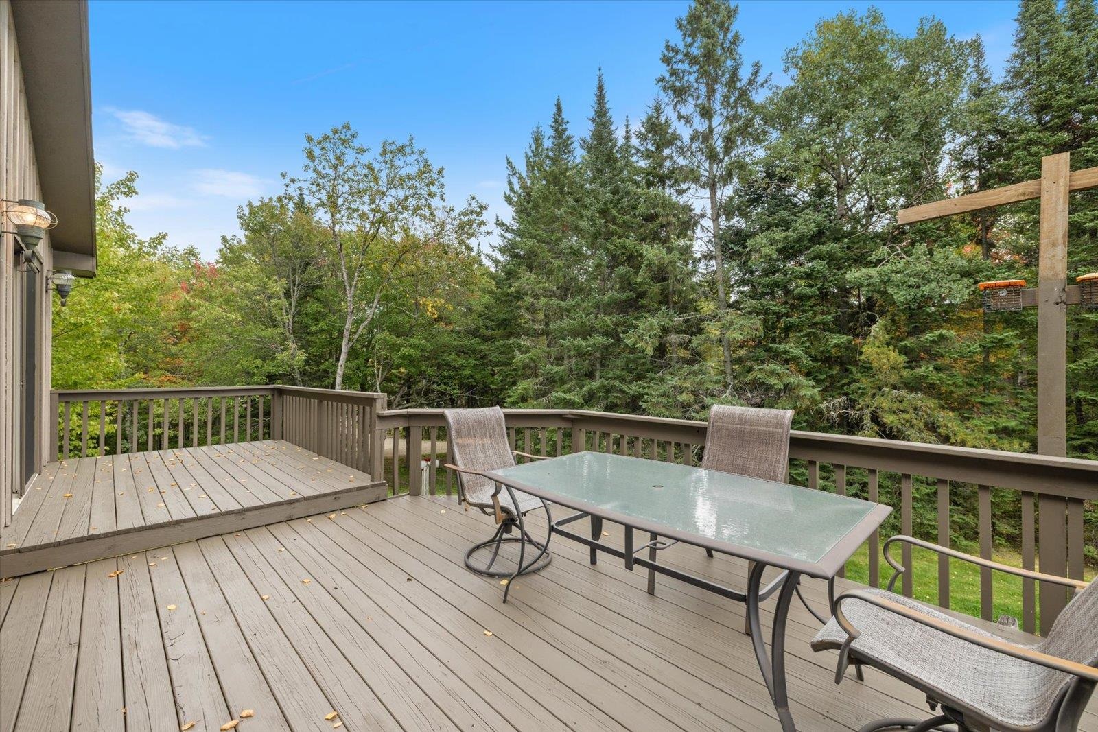 236 East Ahola Road Ely, MN 55731 - Photo 16 of 27 Wooden terrace with outdoor dining space