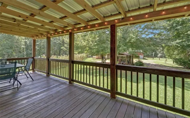 a view of a two chairs in the deck