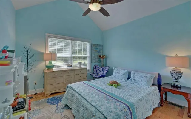 a bathroom with a sink vanity and a mirror