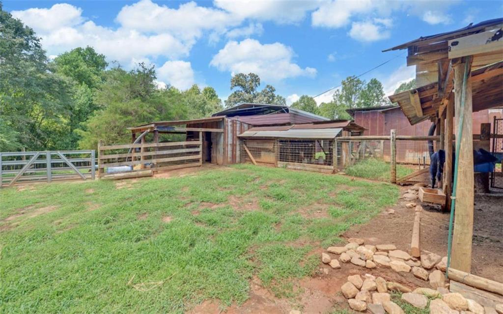 234 Dh Green Road Demorest, GA 30535 - Photo 42 of 57 a view of a house with a backyard