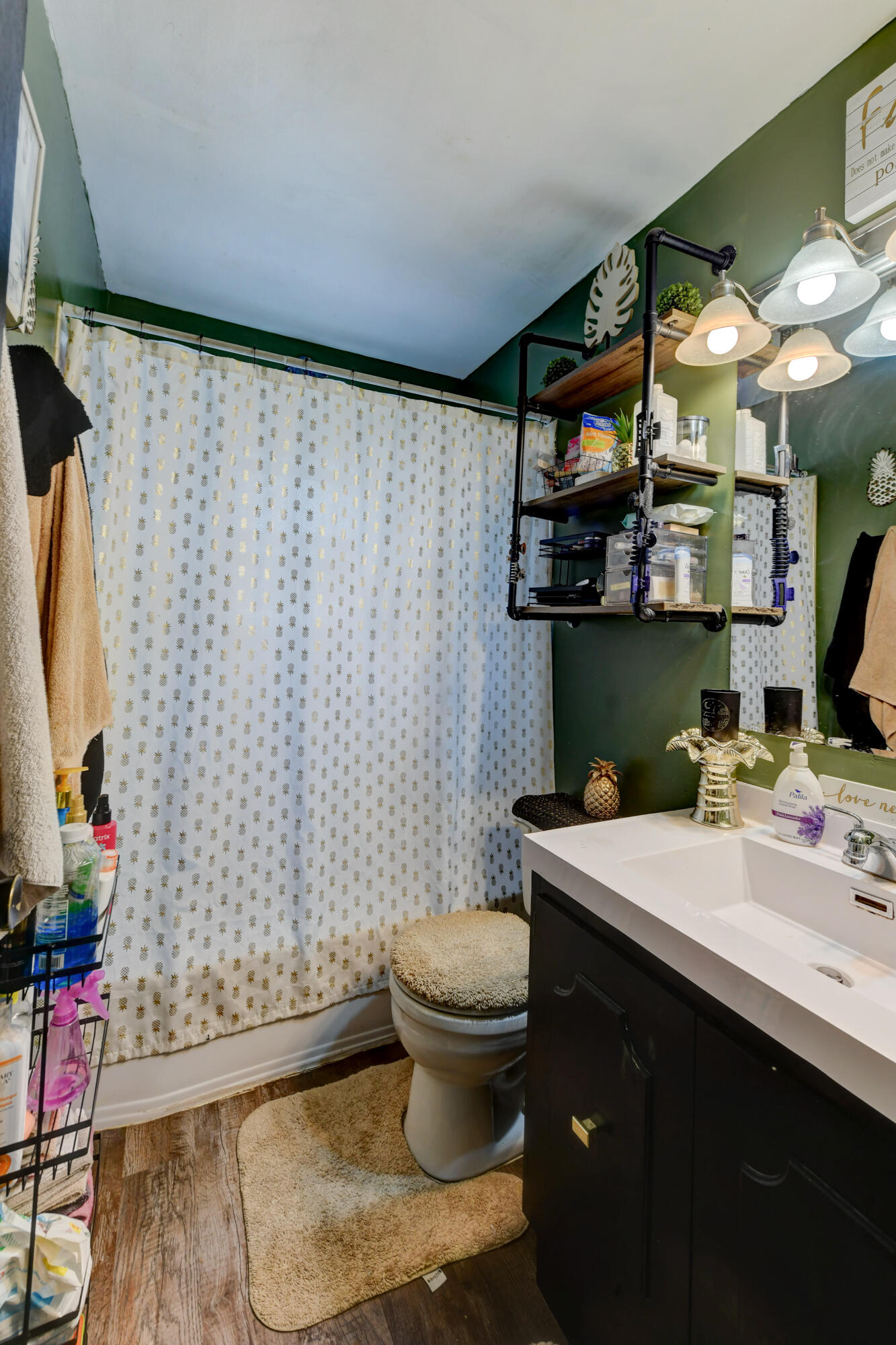 3706 Lexington Road Michigan City, IN 46360 - Photo 11 of 22 a bathroom with a sink toilet and shower