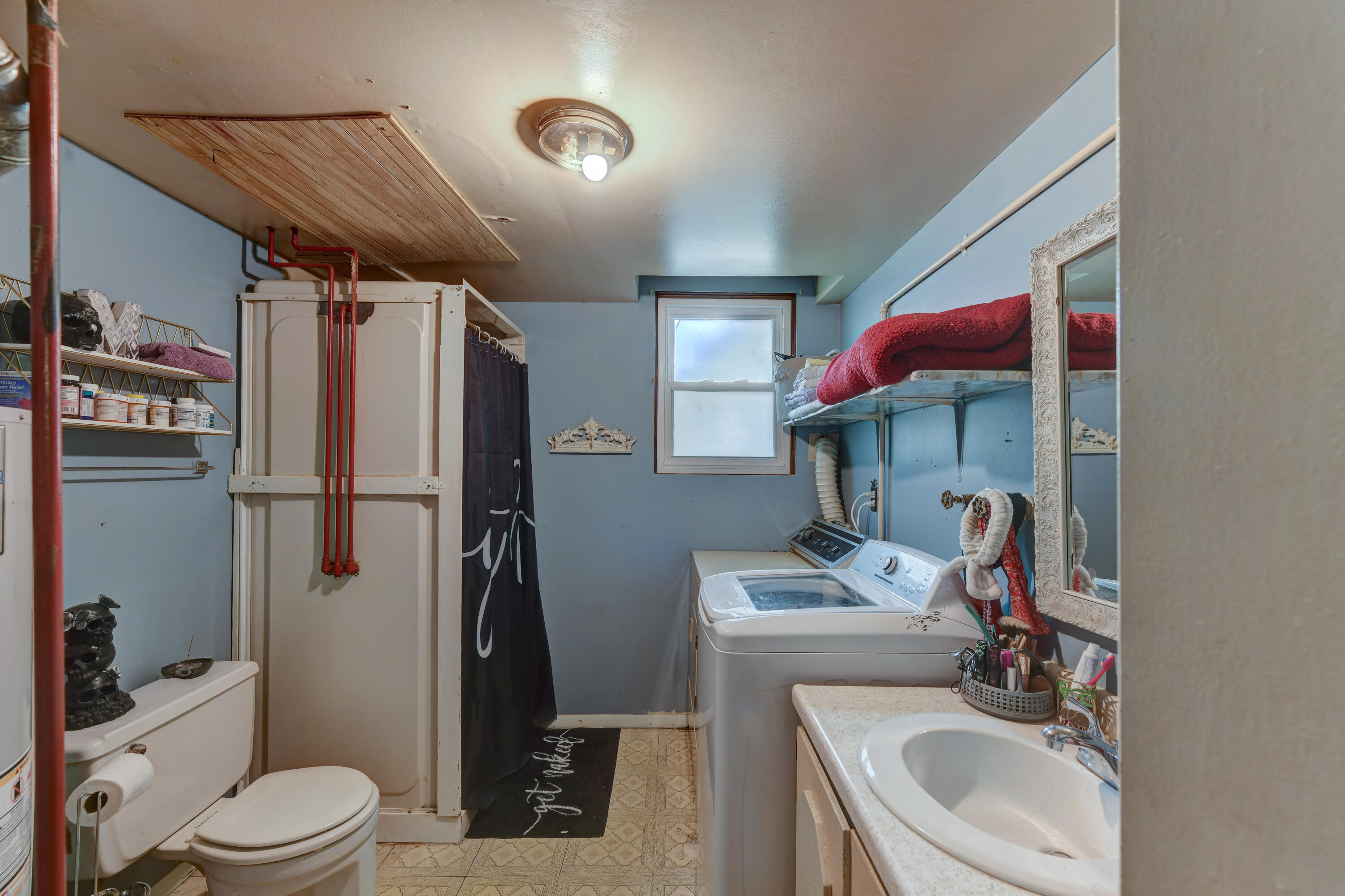 3706 Lexington Road Michigan City, IN 46360 - Photo 14 of 22 a bathroom with a sink toilet vanity tub and shower