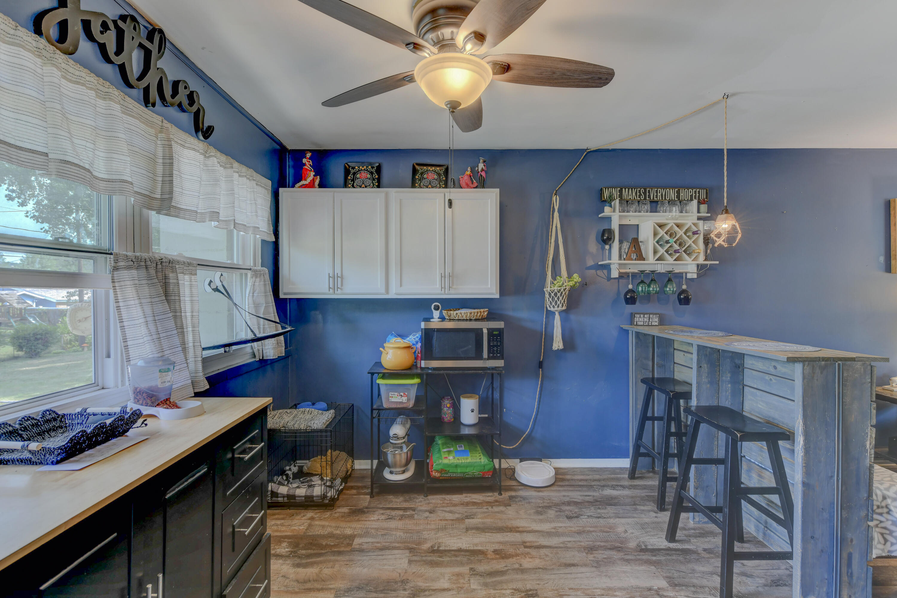 3706 Lexington Road Michigan City, IN 46360 - Photo 6 of 22 a view of kitchen with cabinets and wooden floor