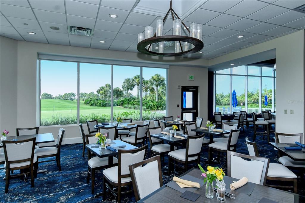 9320 Clubside Circle, Unit 2208 Sarasota, FL 34238 - Photo 33 of 41 a view of a dining room with furniture window and outside view