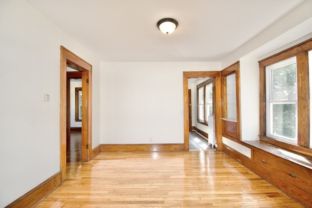 19 Ambrose Street Springfield, MA 01109 - Photo 19 of 32 a view of an empty room with glass door