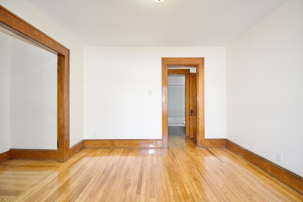 19 Ambrose Street Springfield, MA 01109 - Photo 28 of 32 a view of empty room with wooden floor