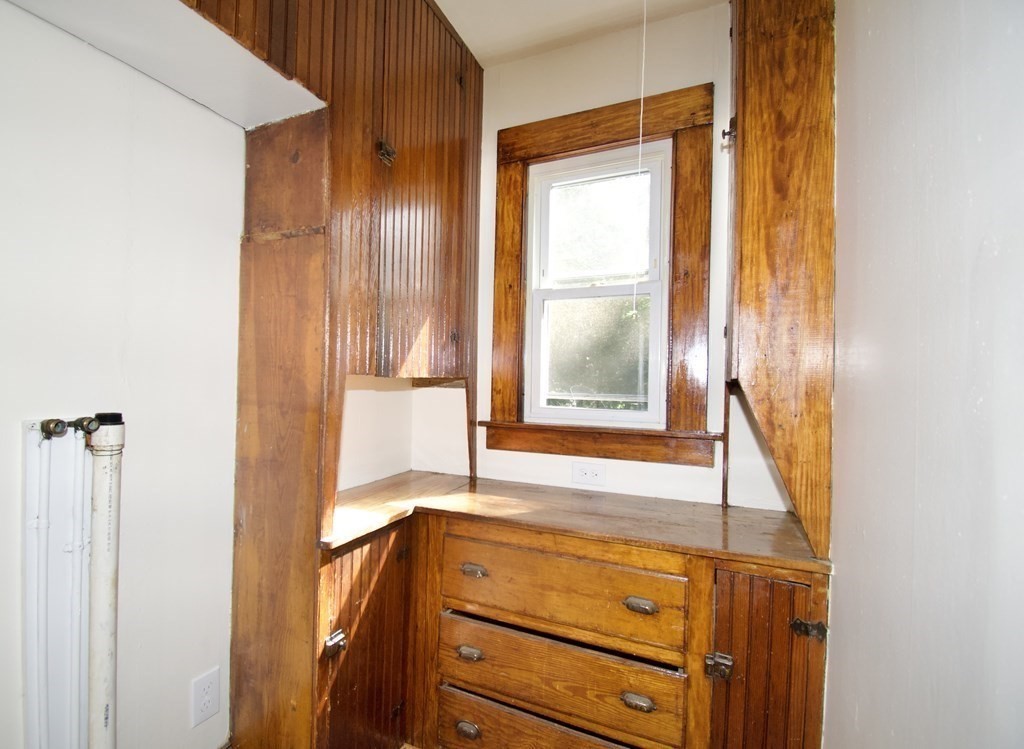 19 Ambrose Street Springfield, MA 01109 - Photo 10 of 32 a view of walk in closet with window