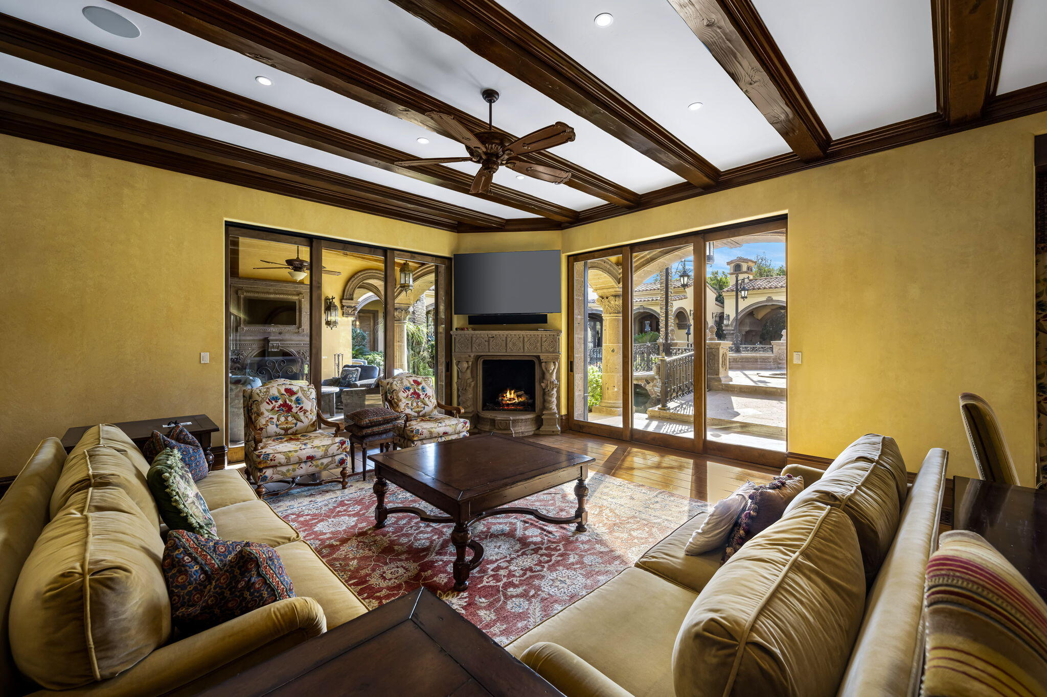 14 Strauss Terrace Rancho Mirage, CA 92270 - Photo 47 of 115 a living room with furniture or outdoor view and a large window
