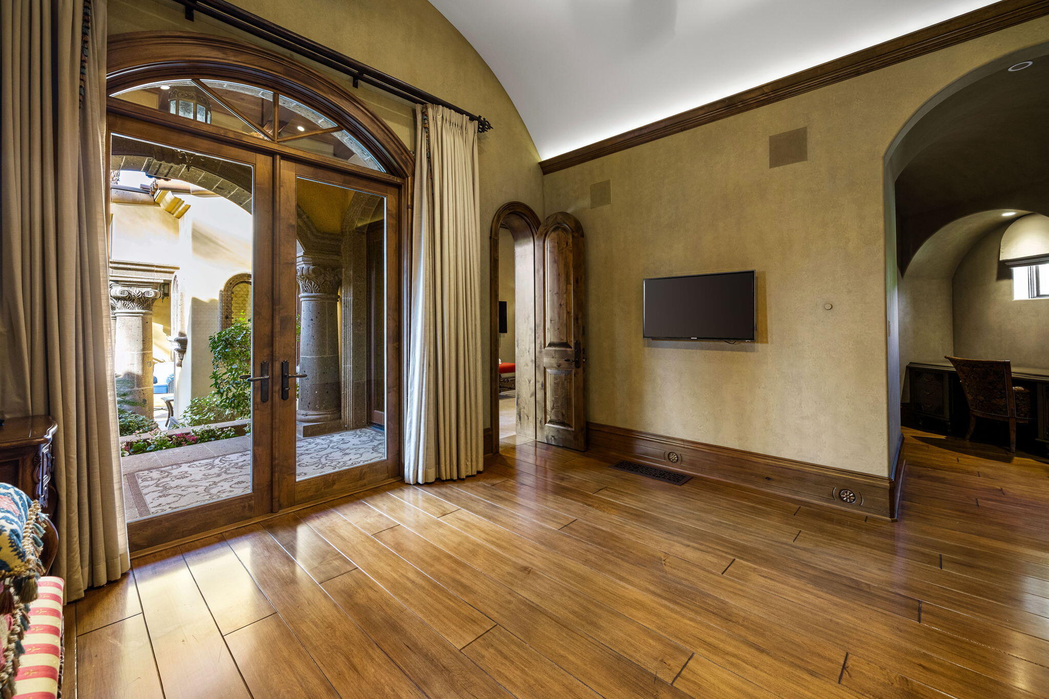 14 Strauss Terrace Rancho Mirage, CA 92270 - Photo 69 of 115 a view of empty room with wooden floor and fan