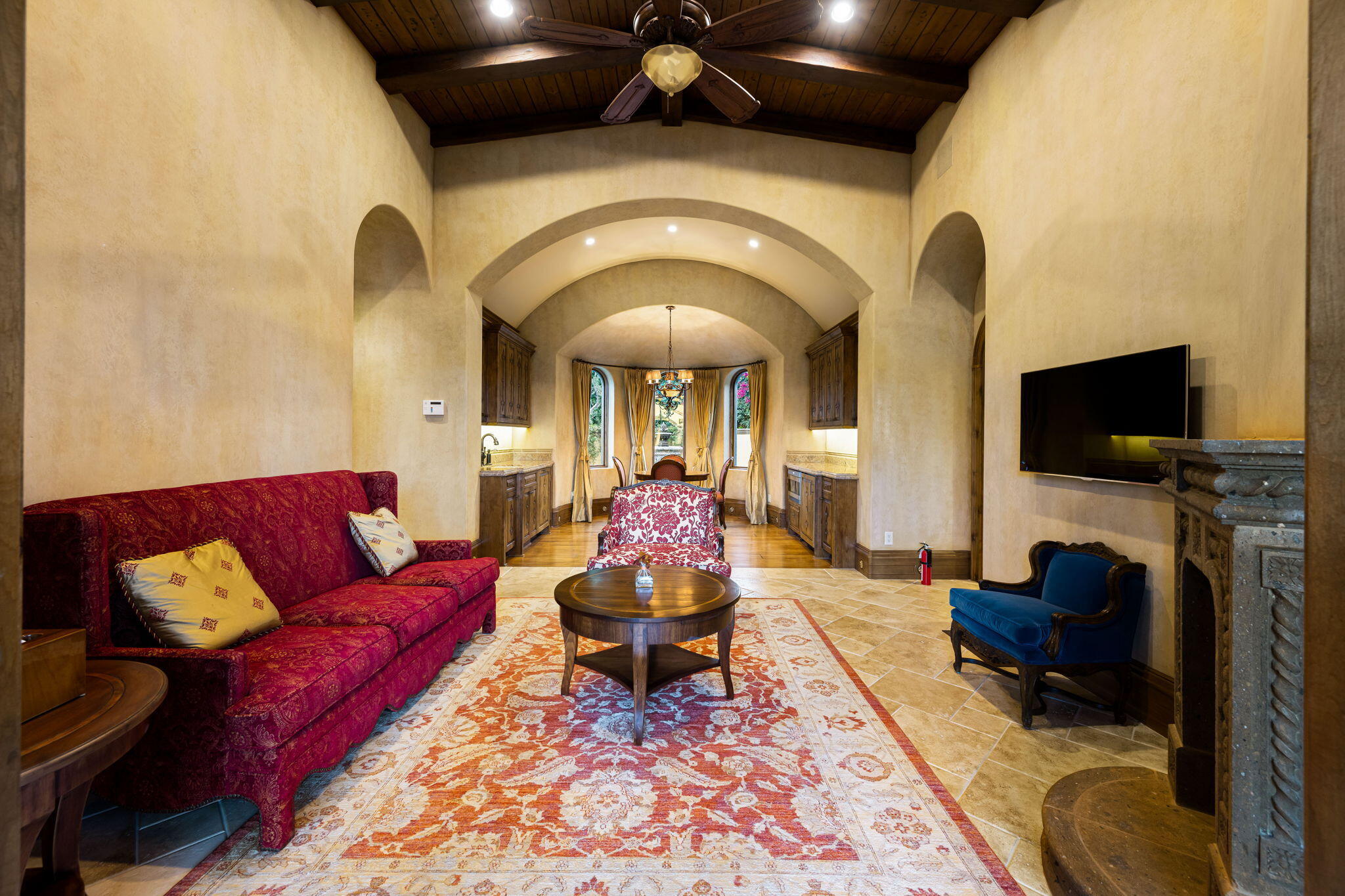 14 Strauss Terrace Rancho Mirage, CA 92270 - Photo 77 of 115 a living room with furniture and a flat screen tv