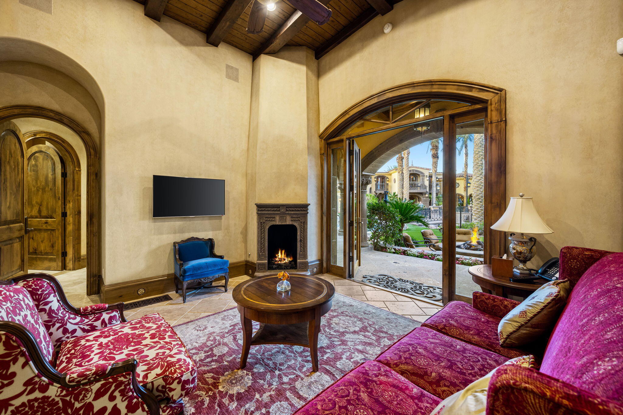 14 Strauss Terrace Rancho Mirage, CA 92270 - Photo 79 of 115 a living room with furniture and a fireplace