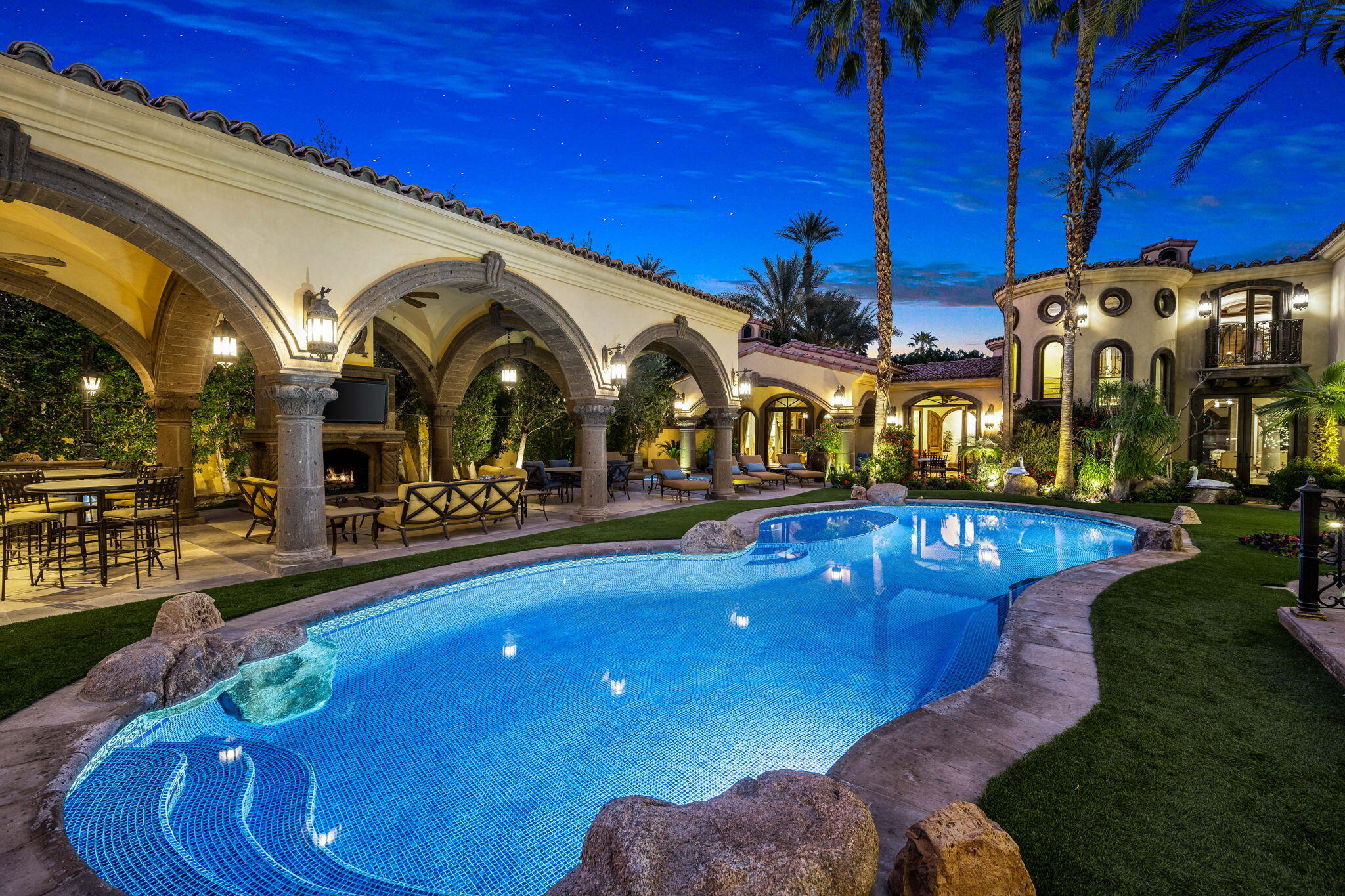 14 Strauss Terrace Rancho Mirage, CA 92270 - Photo 99 of 115 a view of a swimming pool with a patio