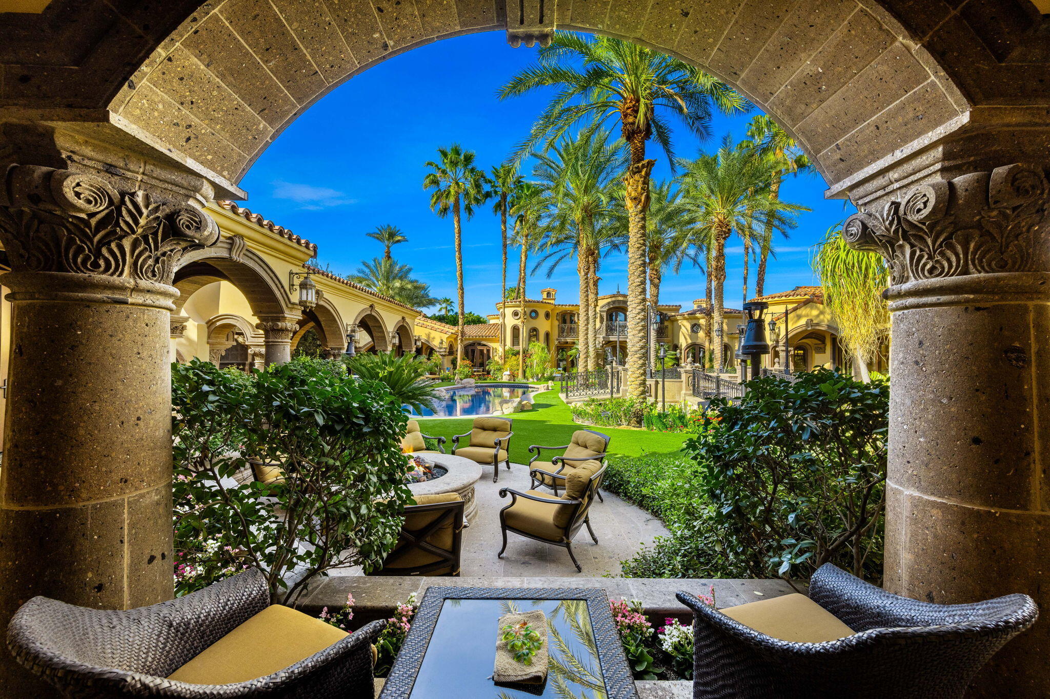 14 Strauss Terrace Rancho Mirage, CA 92270 - Photo 10 of 115 a view of swimming pool with outdoor seating and plants