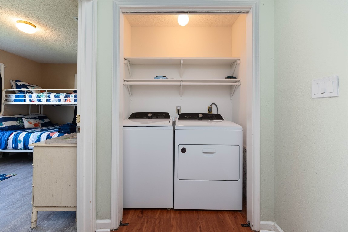 4729 Jolly Roger Road Jamaica Beach, TX 77554 - Photo 30 of 45 a room with storage and utility