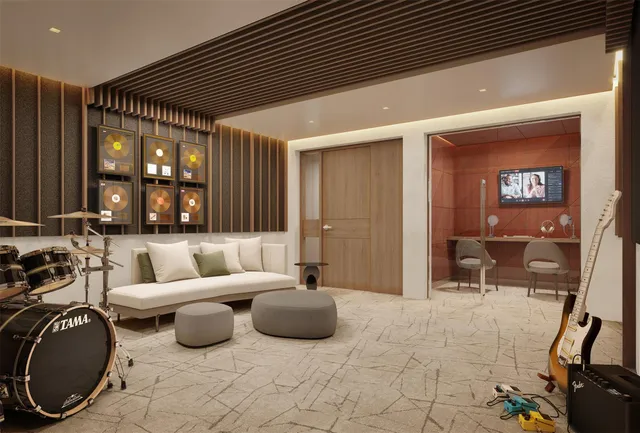 a living room with furniture a mirror and gym equipment