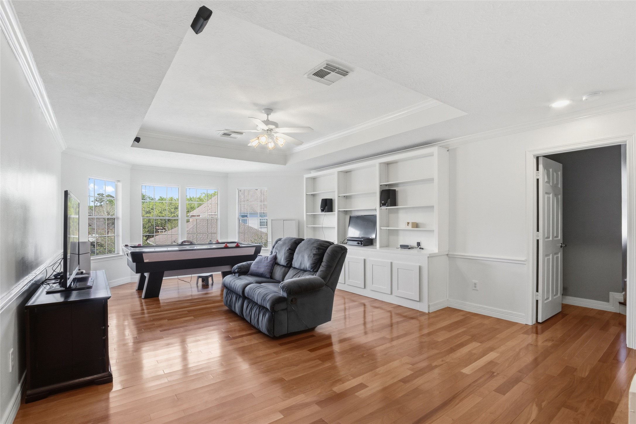 4411 Cedar Ridge Trail Houston, TX 77059 - Photo 24 of 32 a living room with furniture and a wooden floor