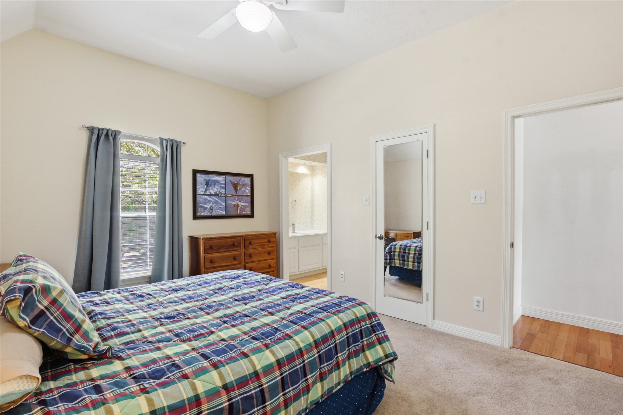 4411 Cedar Ridge Trail Houston, TX 77059 - Photo 27 of 32 a bedroom with a bed and a dresser