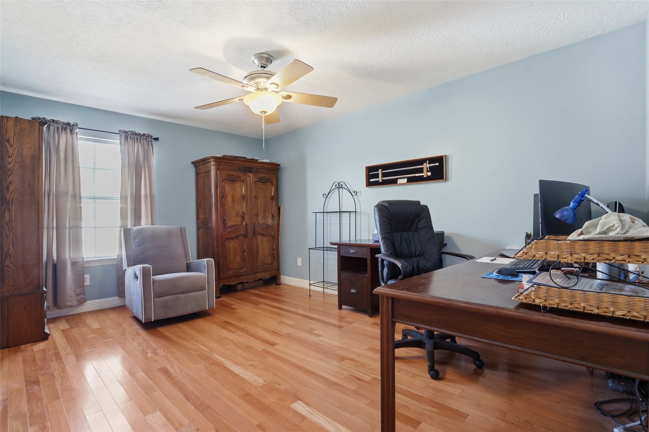 4411 Cedar Ridge Trail Houston, TX 77059 - Photo 29 of 32 a living room with furniture and wooden floor