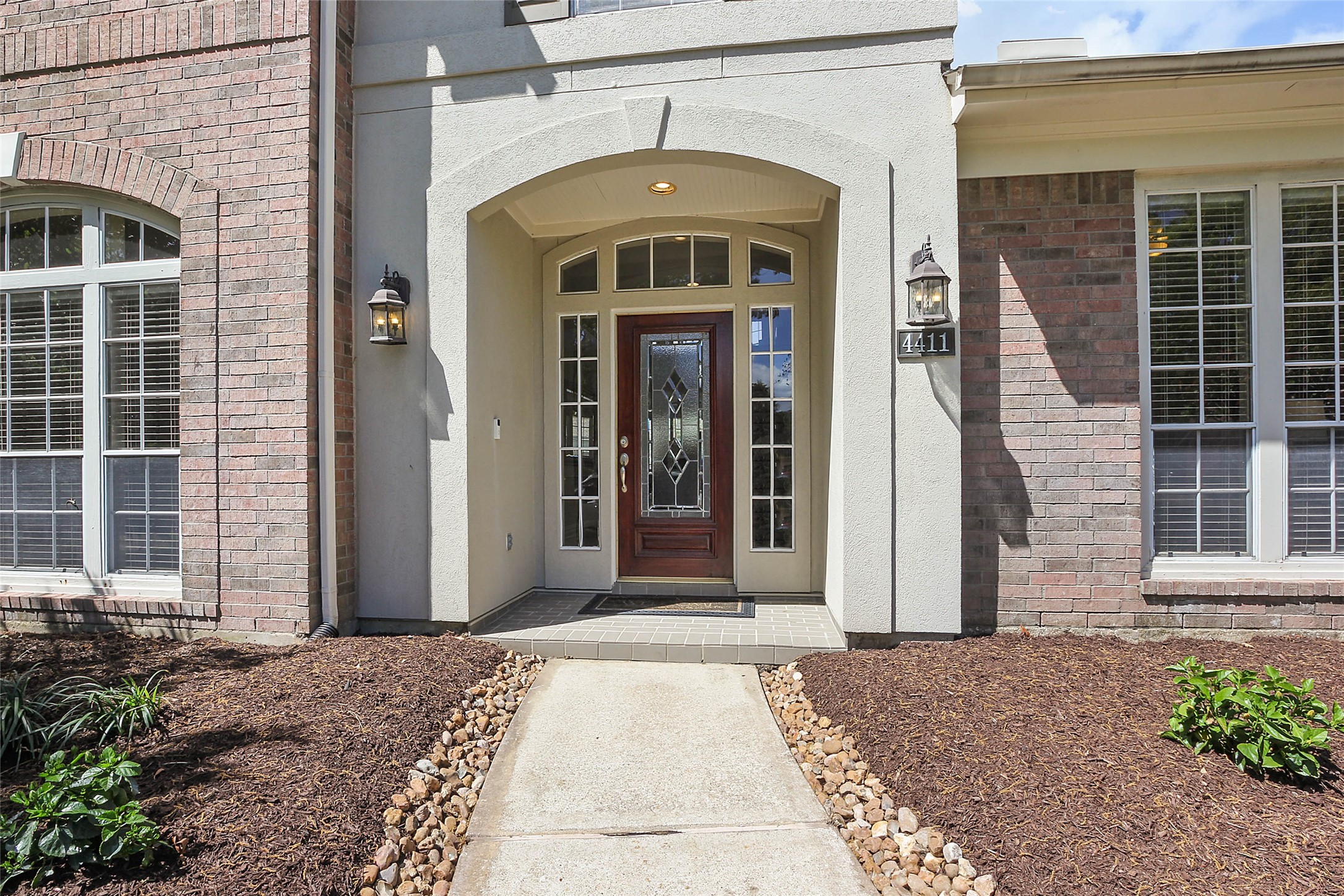 4411 Cedar Ridge Trail Houston, TX 77059 - Photo 3 of 32 a front view of a house with large windows