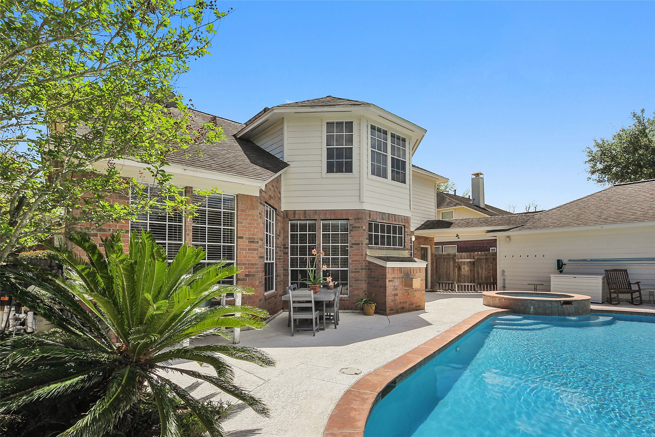 4411 Cedar Ridge Trail Houston, TX 77059 - Photo 7 of 32 a view of a house with backyard and sitting area
