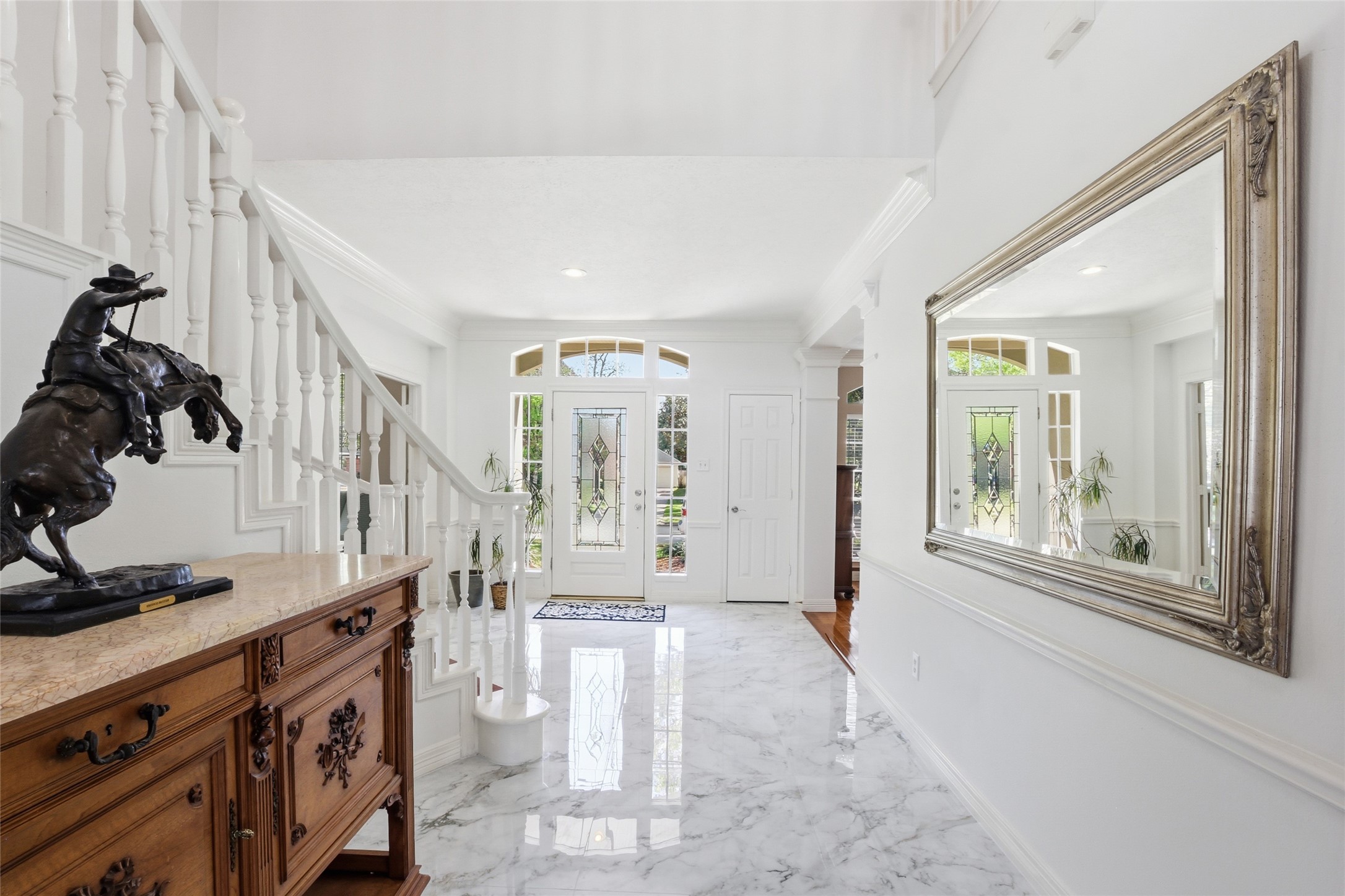 4411 Cedar Ridge Trail Houston, TX 77059 - Photo 10 of 32 a view of an entryway with wooden floor and windows