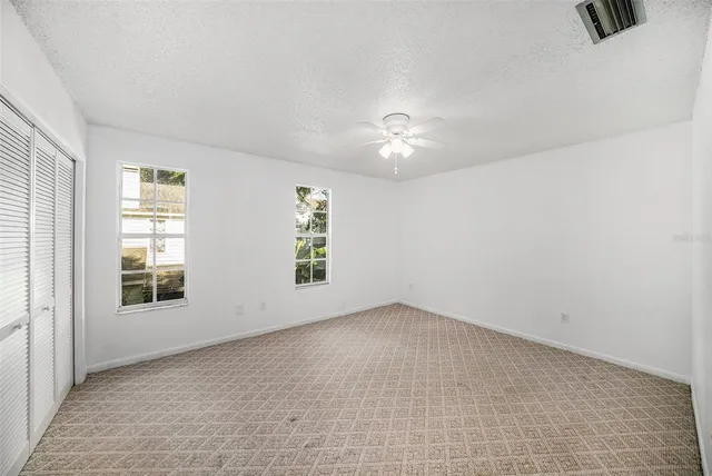 an empty room with windows