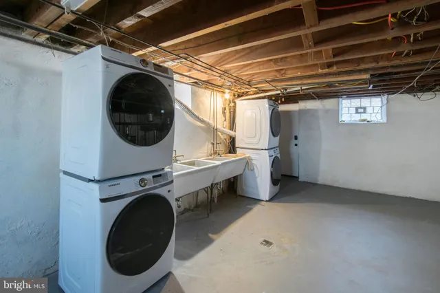 a utility room with dryer and washer